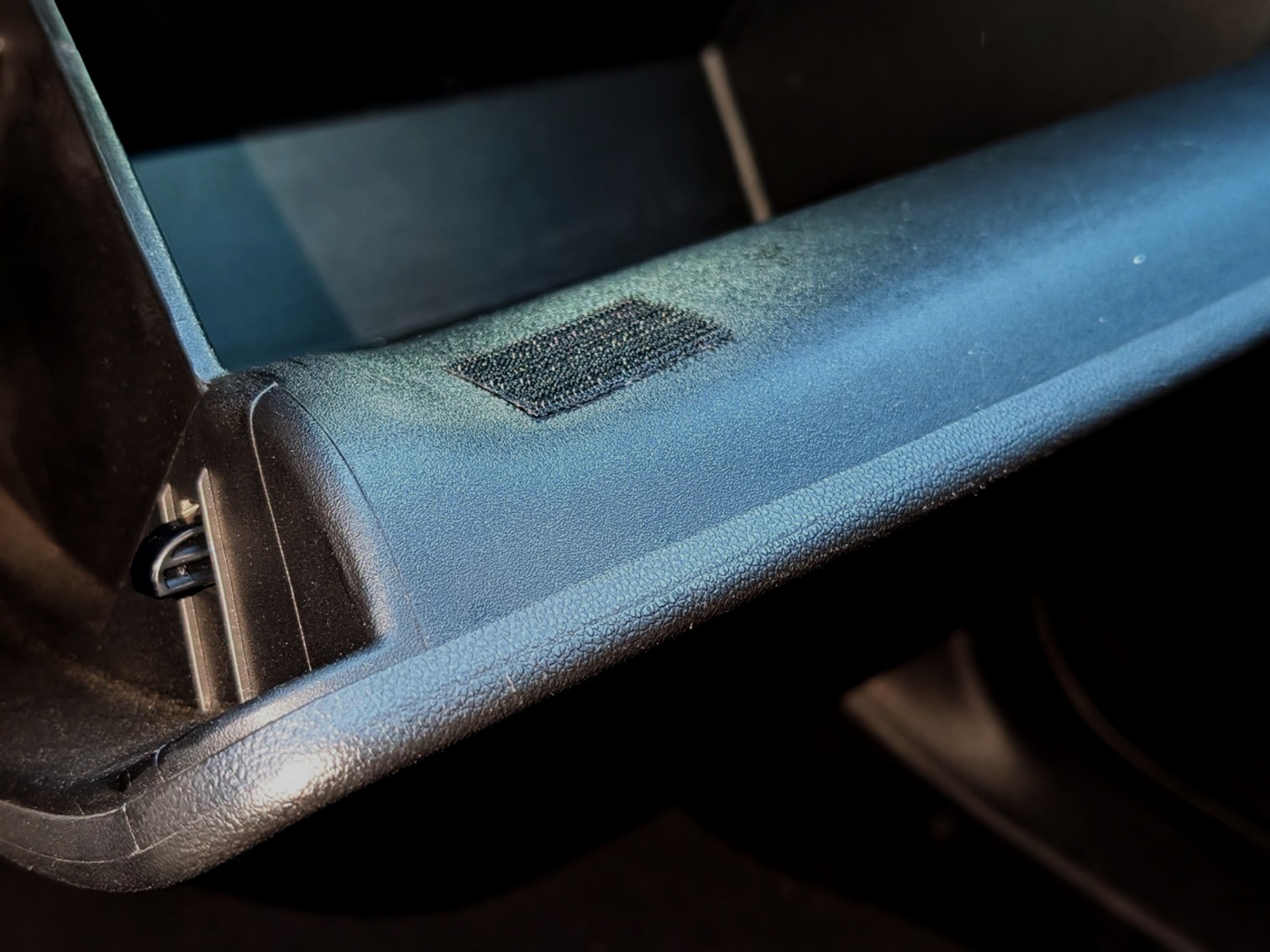 ShadeShark hook and loop attachment system for secure glove compartment installation